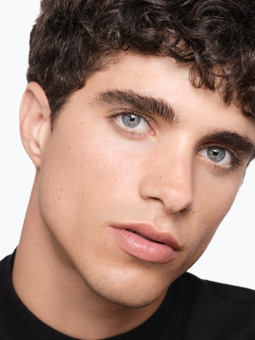 Gesicht eines jungen, gepflegten Mannes