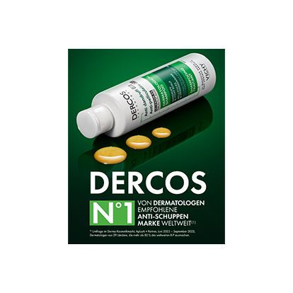 Vichy Dercos Anti-Schuppen-Shampoo liegt auf rechten Seite auf einem grünen Untergrund, neben mehreren goldgelben Shampoo-Tropfen. Links steht in großer Schrift: „DERCOS N°1 von Dermatologen empfohlene Anti-Schuppen-Marke weltweit