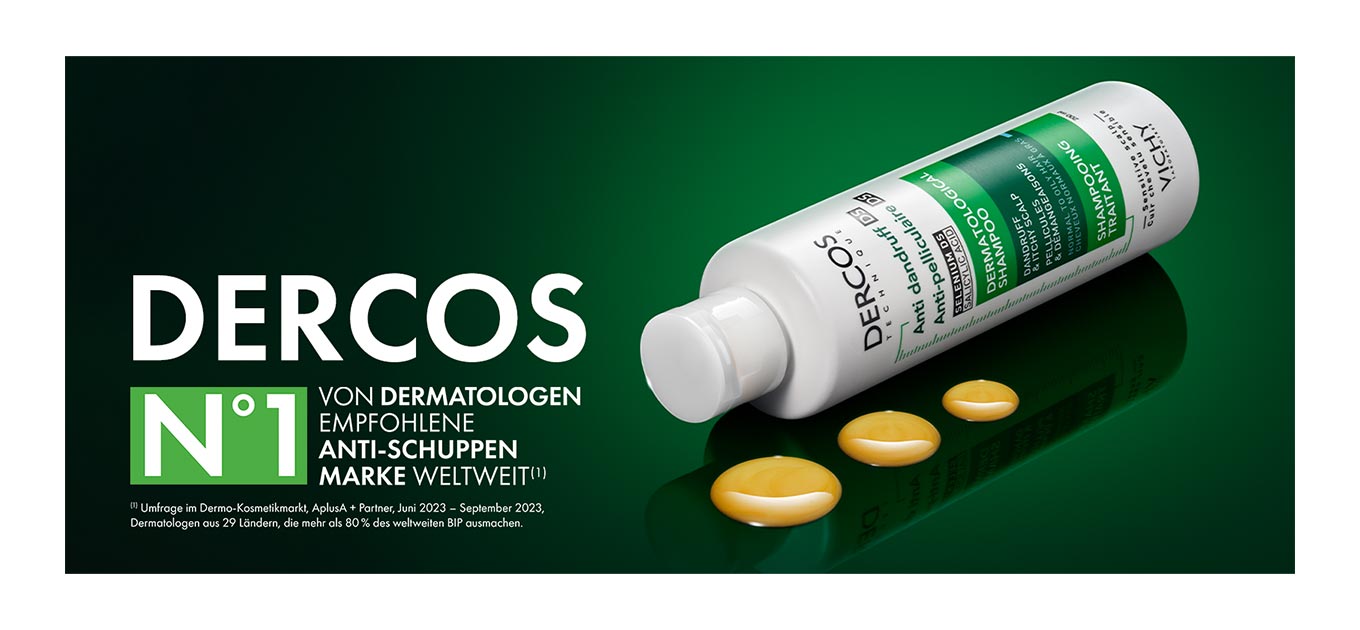 Vichy Dercos Anti-Schuppen-Shampoo liegt auf rechten Seite auf einem grünen Untergrund, neben mehreren goldgelben Shampoo-Tropfen. Links steht in großer Schrift: „DERCOS N°1 von Dermatologen empfohlene Anti-Schuppen-Marke weltweit