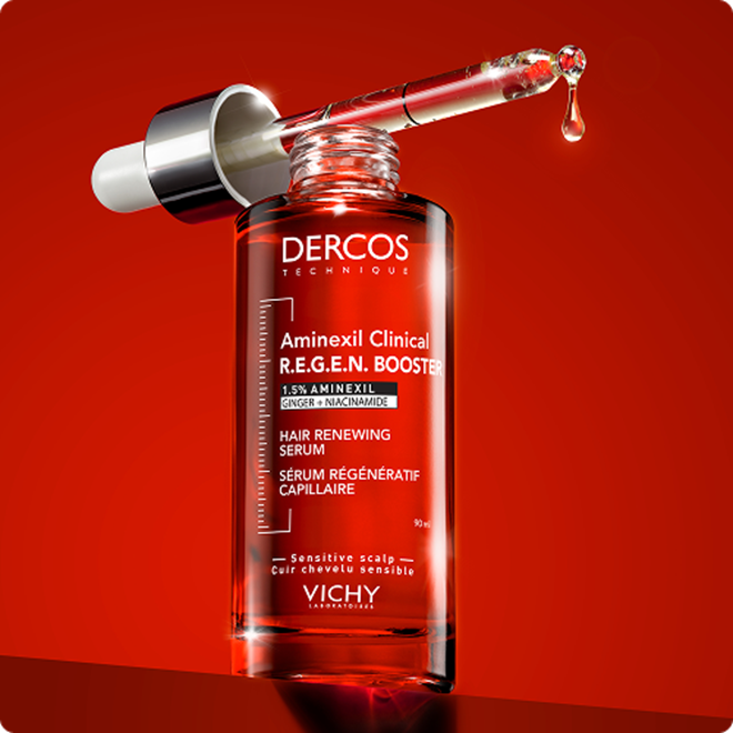 Vichy DERCOS Aminexil Clinical 5 R.E.G.E.N. Boost Serum-Flakon vor rotem Hintergrund