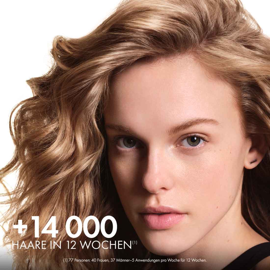 Frau mit dichtem, gesundem Haar – steht für sichtbare Stärke und Pflegeerfolg