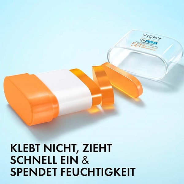 Vichy Capital Soleil UV Aqua Invisible Stick LSF 50+ liegt geöffnet in Einzelteilen, Text im Bild: klebt nicht, zieht schnell ein, spendet Feuchtigkeit